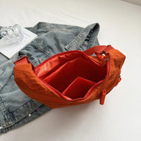 Sac bandoulière plat en nylon déperlant