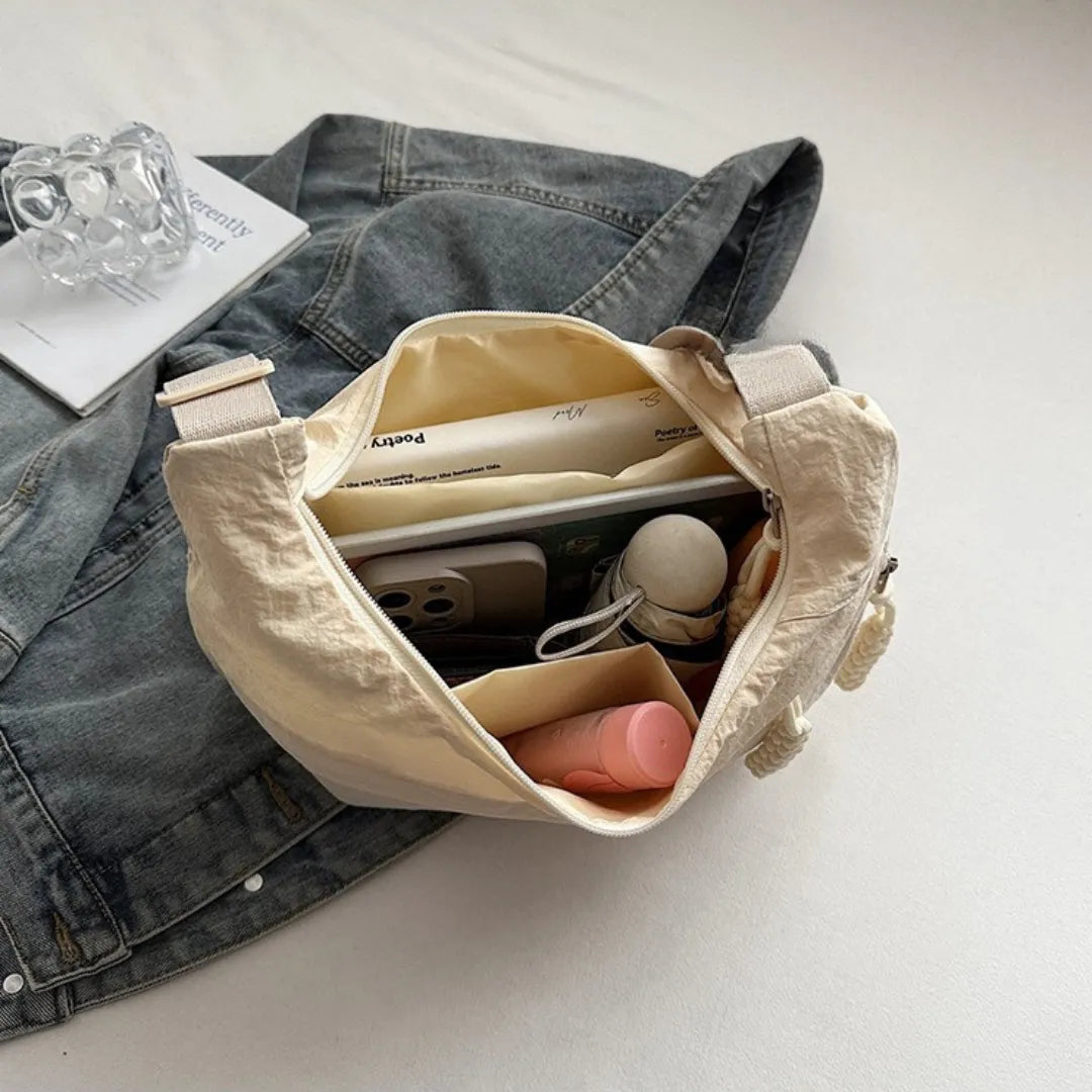 Sac bandoulière plat en nylon déperlant
