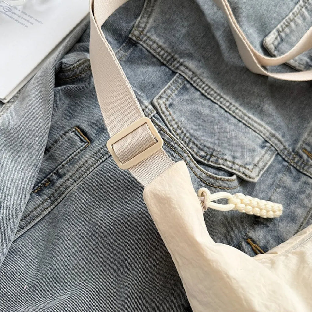 Sac bandoulière plat en nylon déperlant
