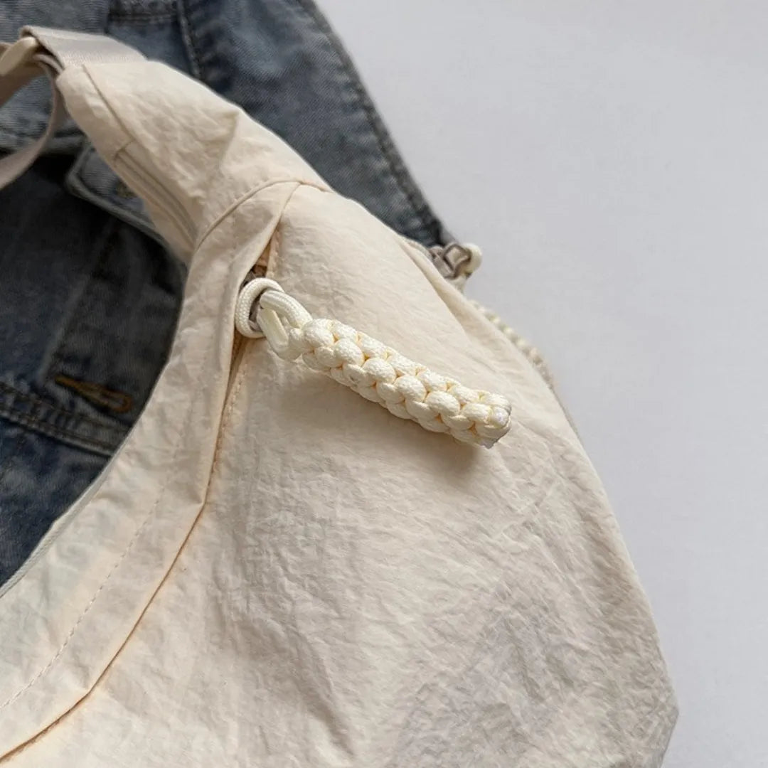 Sac bandoulière plat en nylon déperlant