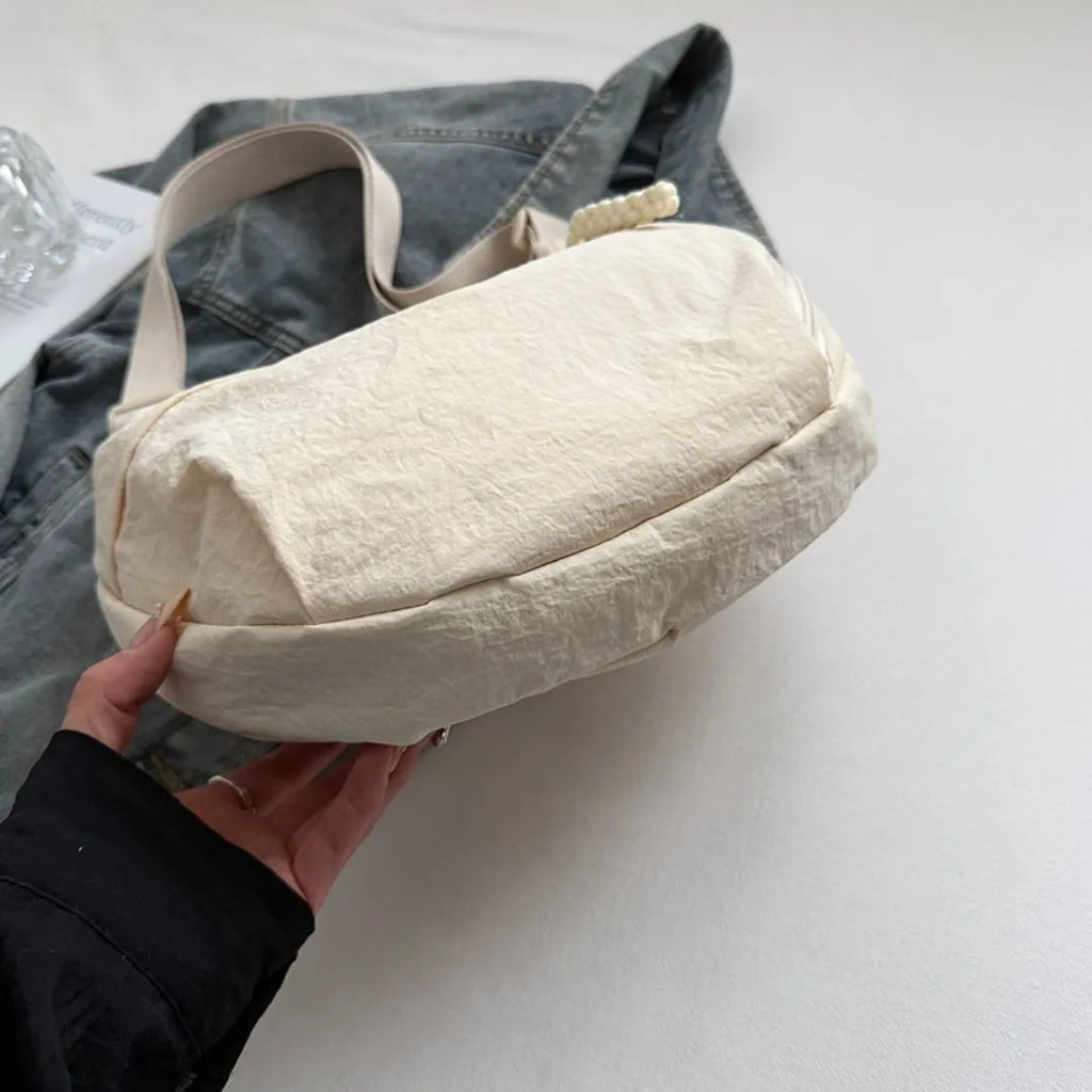 Sac bandoulière plat en nylon déperlant