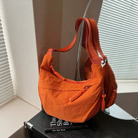 Sac bandoulière plat en nylon déperlant