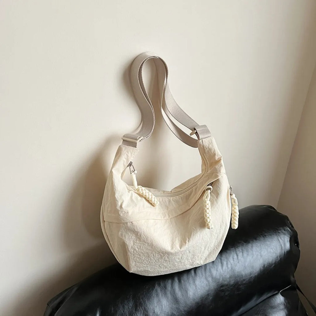 Sac bandoulière plat en nylon déperlant