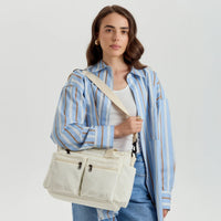 Sac bandoulière en velours côtelé à poches zippées