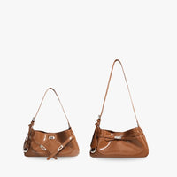 Sac à main coussin en cuir véritable à fermoir tournant