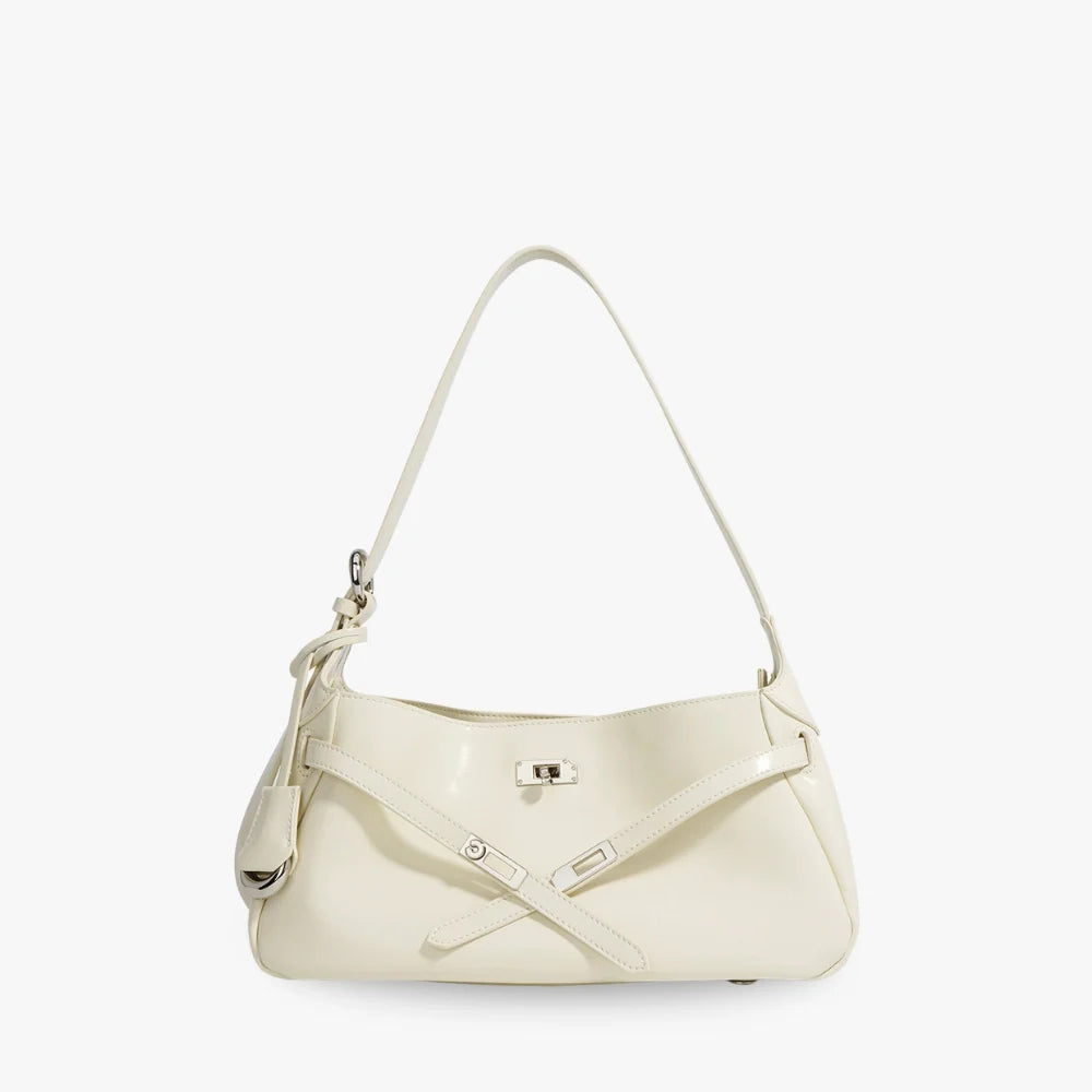Sac à main coussin en cuir véritable à fermoir tournant