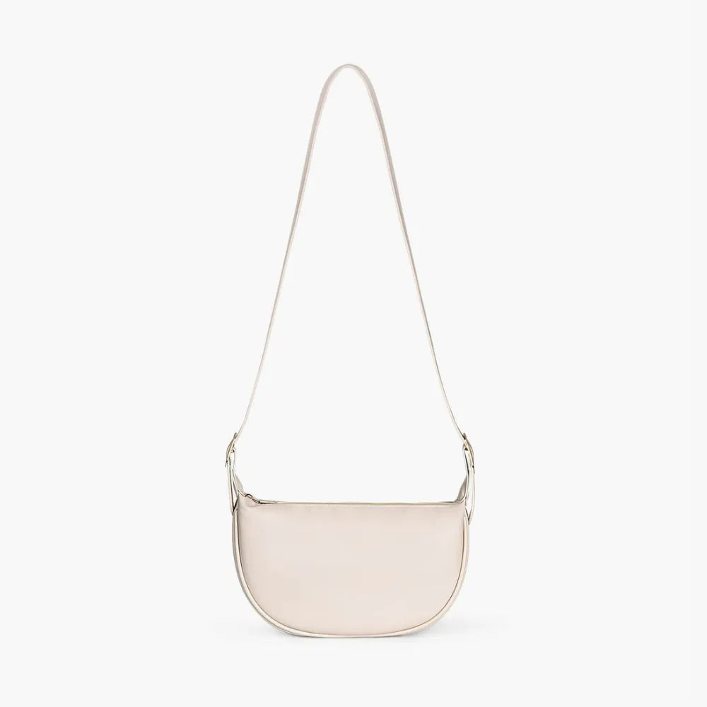 Sac demi-lune porté épaule en simili cuir lisse