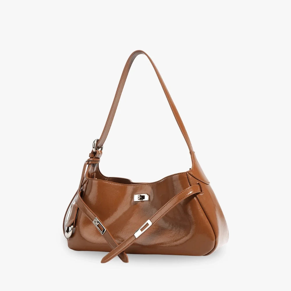 Sac à main coussin en cuir véritable à fermoir tournant