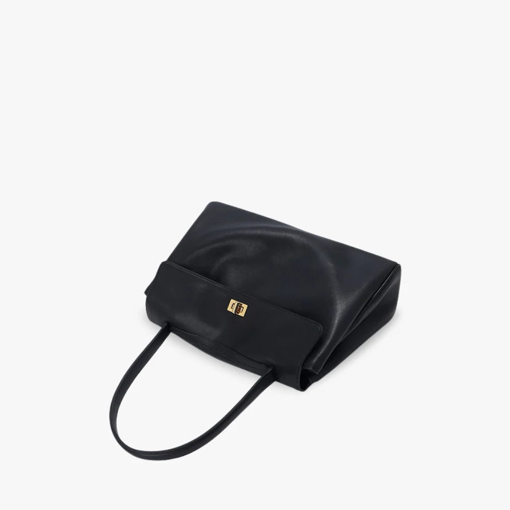 Sac à main en cuir véritable à rabat et fermoir doré