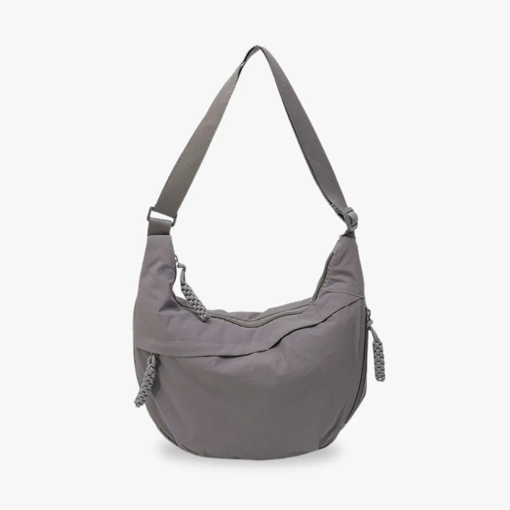 Sac bandoulière plat en nylon déperlant