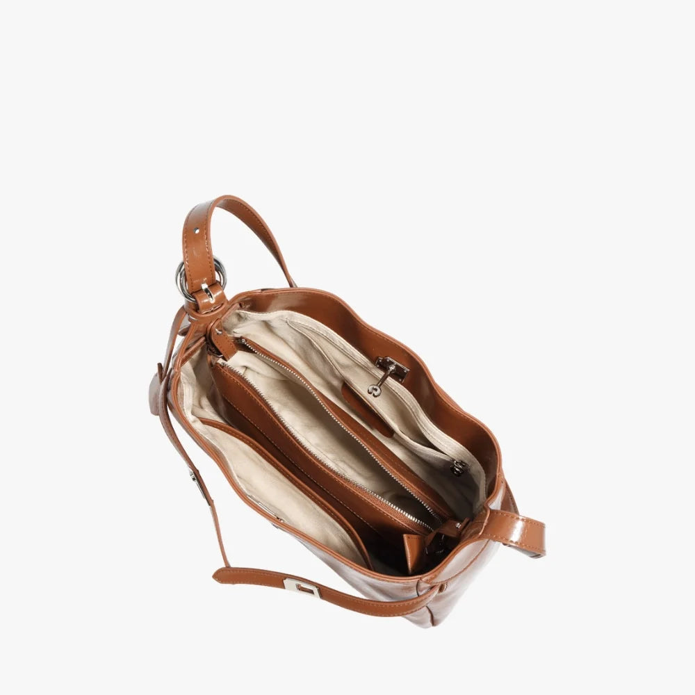 Sac à main coussin en cuir véritable à fermoir tournant