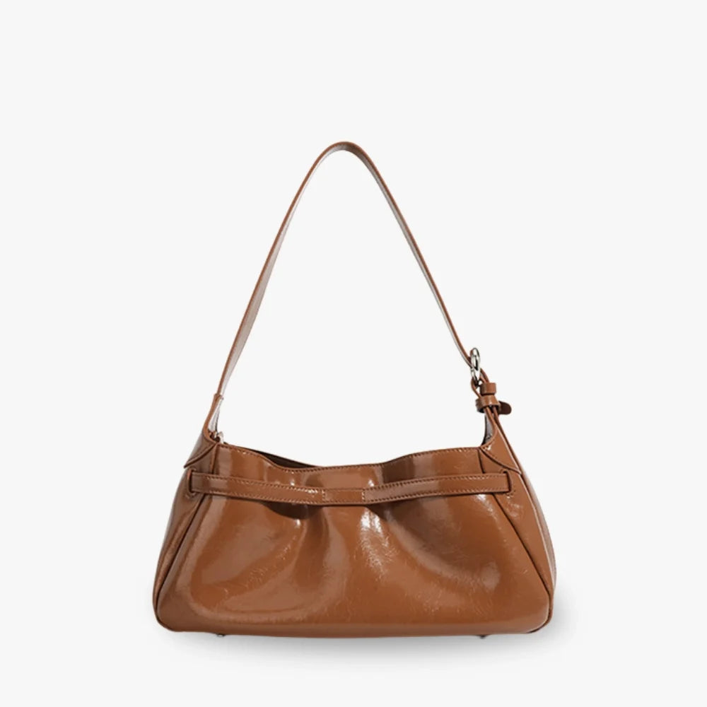 Sac à main coussin en cuir véritable à fermoir tournant
