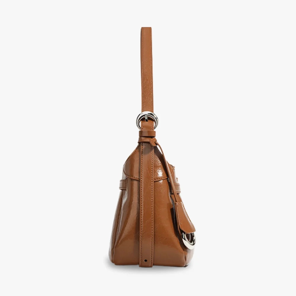 Sac à main coussin en cuir véritable à fermoir tournant