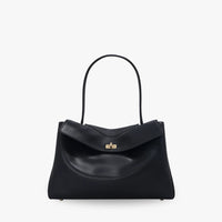 Sac à main en cuir véritable à rabat et fermoir doré