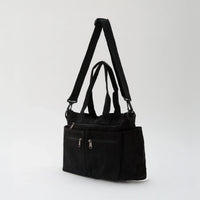 Sac bandoulière en velours côtelé à poches zippées