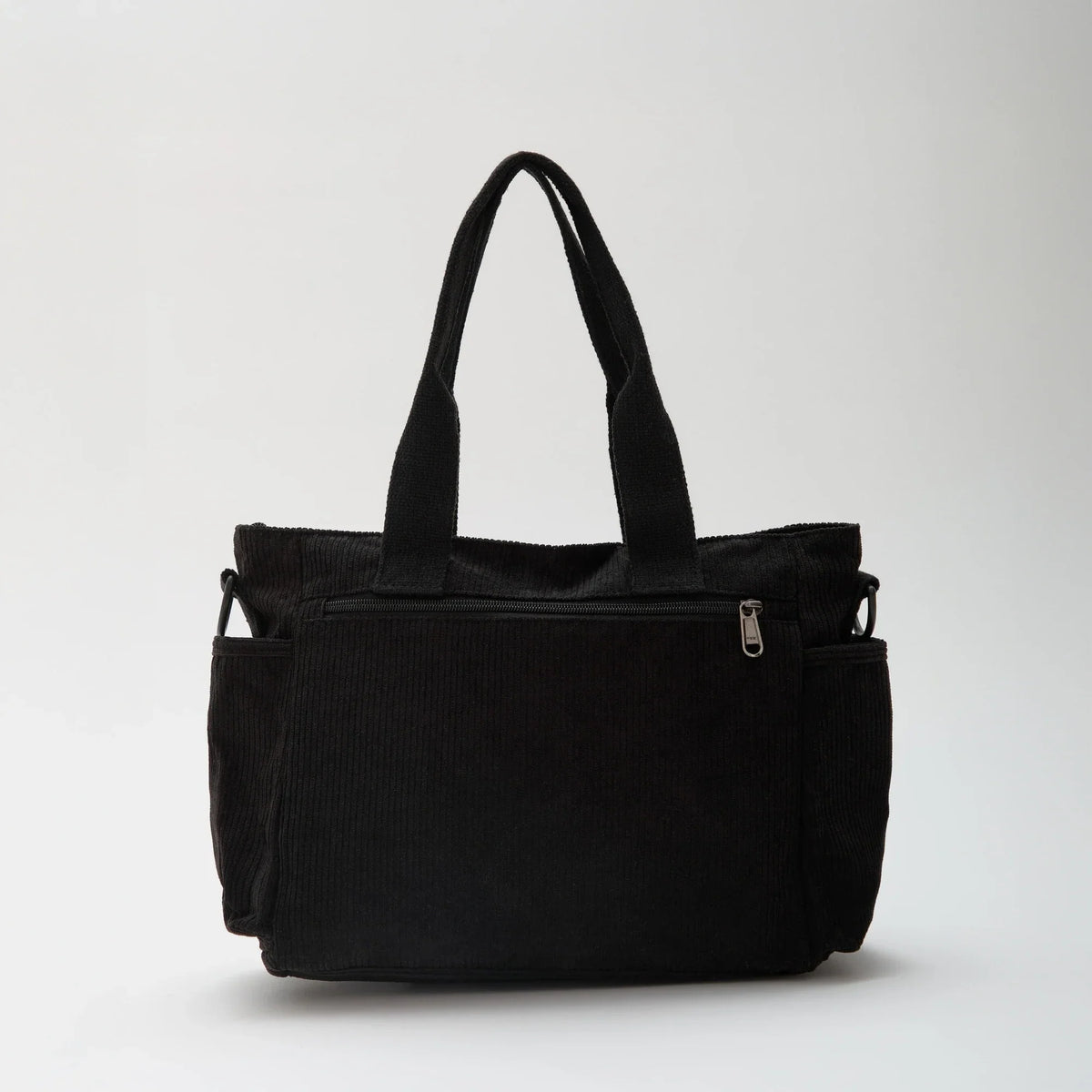 Sac bandoulière en velours côtelé à poches zippées