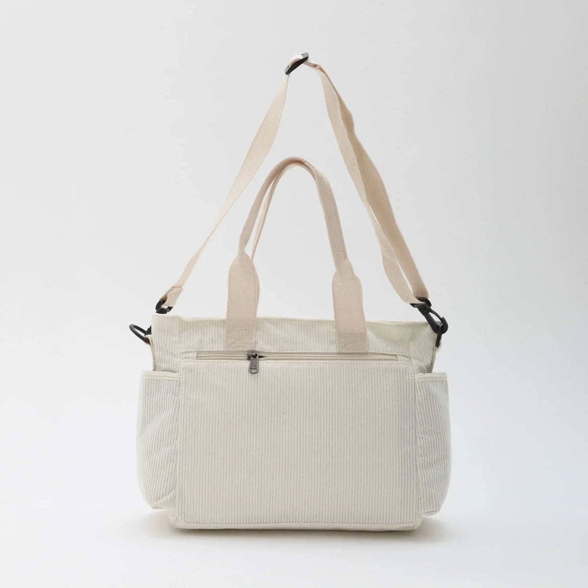 Sac bandoulière en velours côtelé à poches zippées