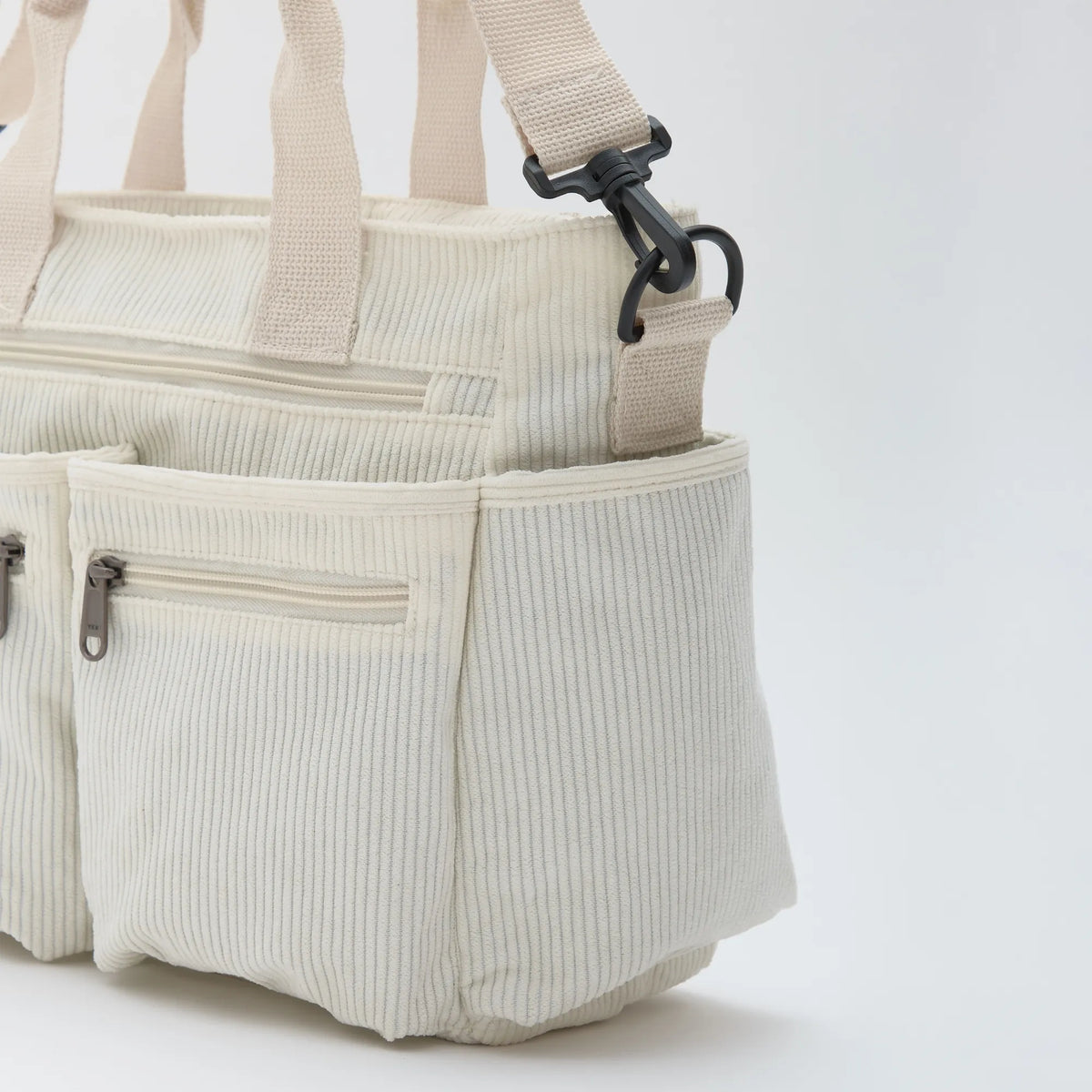Sac bandoulière en velours côtelé à poches zippées