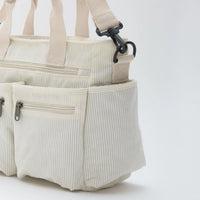 Sac bandoulière en velours côtelé à poches zippées