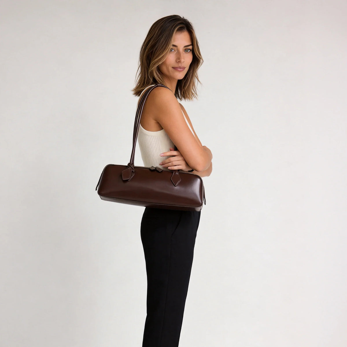 Sac à main allongé en cuir véritable brillant