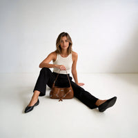 Sac à main coussin en cuir véritable à fermoir tournant
