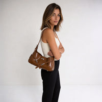 Sac à main coussin en cuir véritable à fermoir tournant
