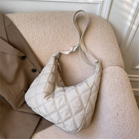Sac bandoulière matelassé en nylon à motif losange