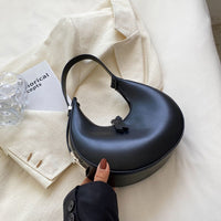 Sac demi-lune en simili cuir à bandoulière réglable