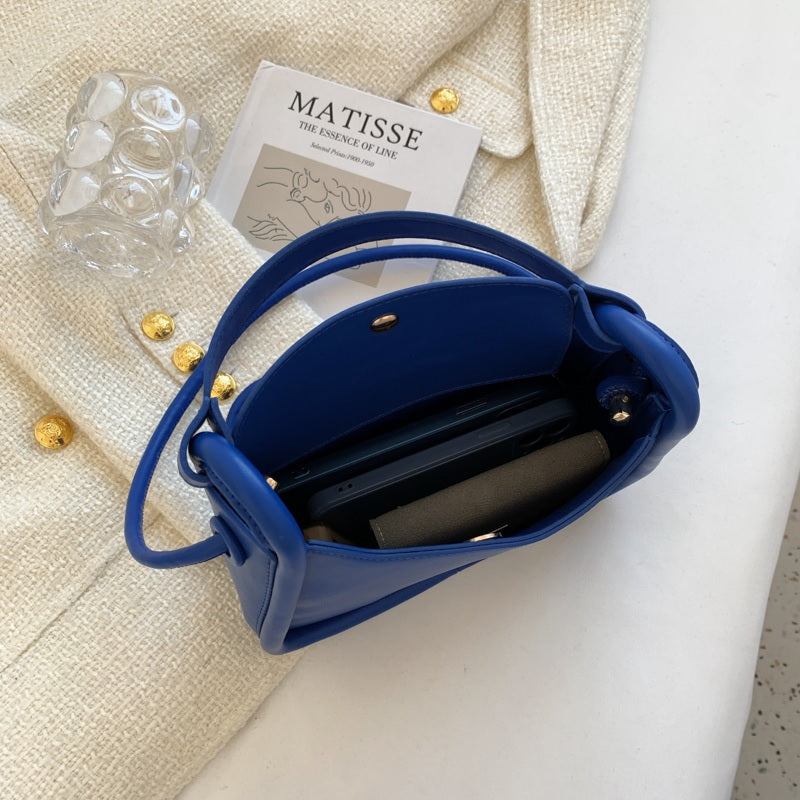 Petit sac bandoulière minimaliste en simili cuir