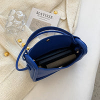 Petit sac bandoulière minimaliste en simili cuir