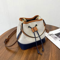 Petit sac seau en toile légère à cordon