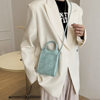 Mini sac à main tressé en simili cuir