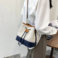Petit sac seau en toile légère à cordon