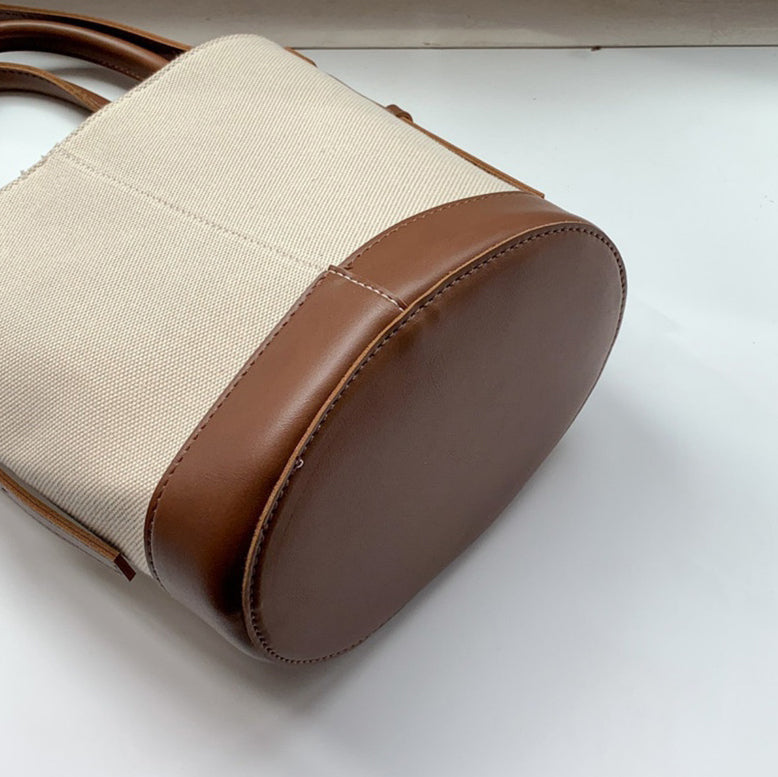 Sac seau en toile texturée à bandoulière réglable