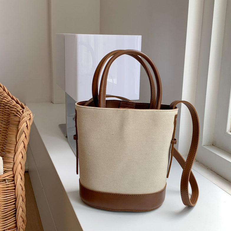 Sac seau en toile texturée à bandoulière réglable