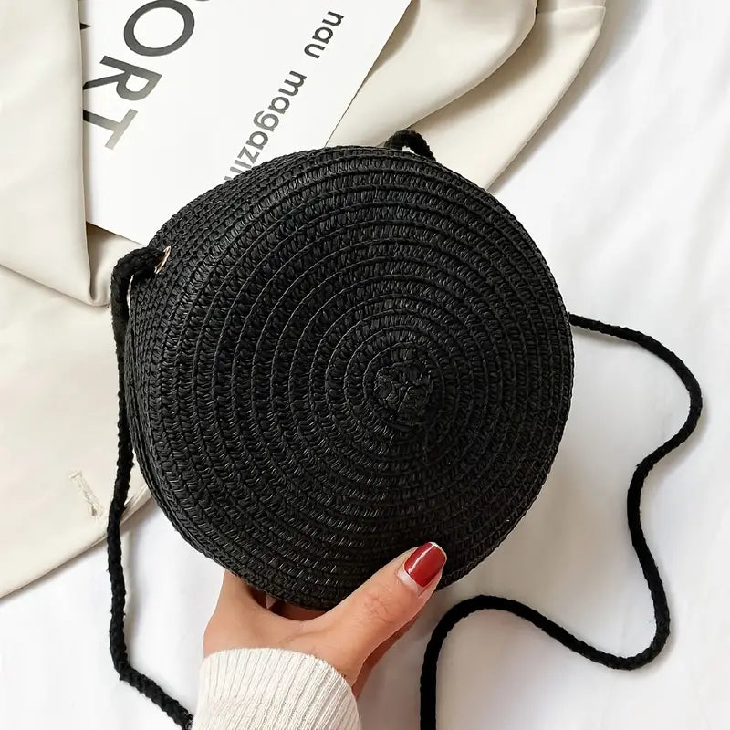 Petit sac rond en paille à bandoulière en corde