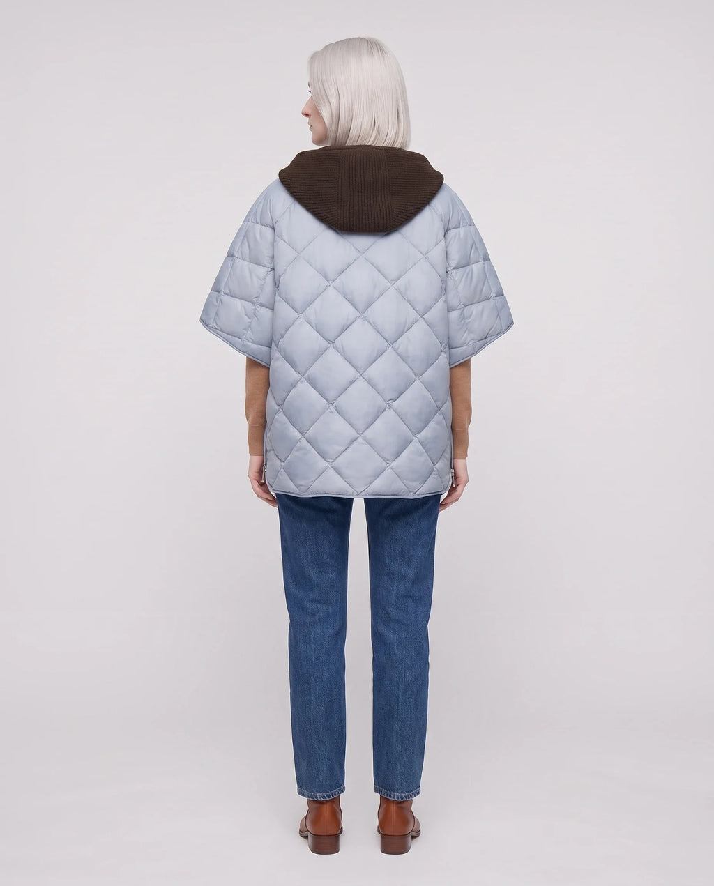 Cape matelassée à capuche tricot