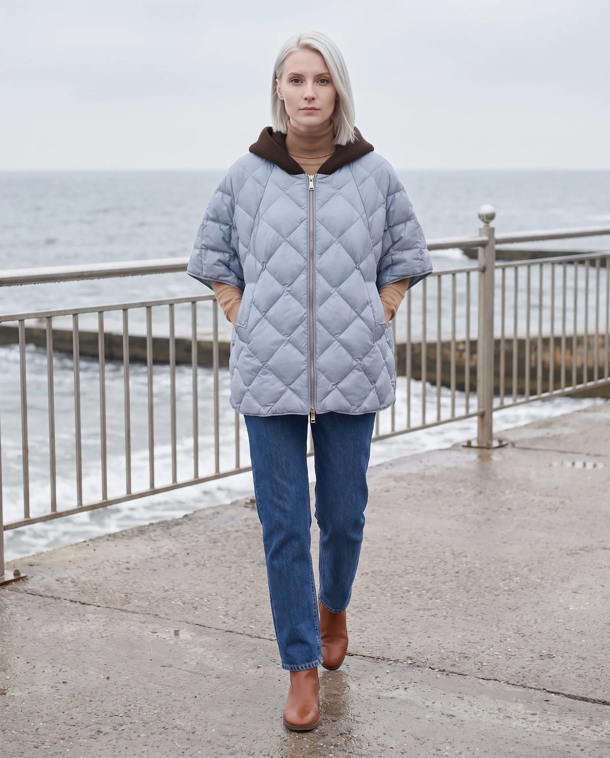 Cape matelassée à capuche tricot
