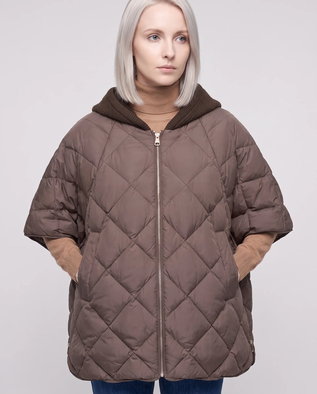 Cape matelassée à capuche tricot
