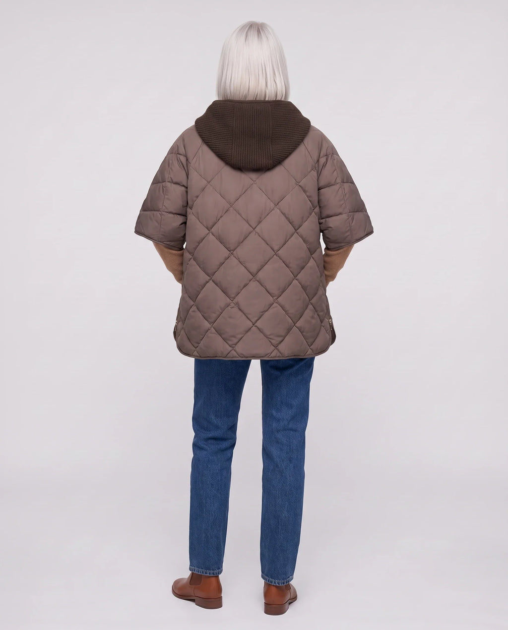 Cape matelassée à capuche tricot