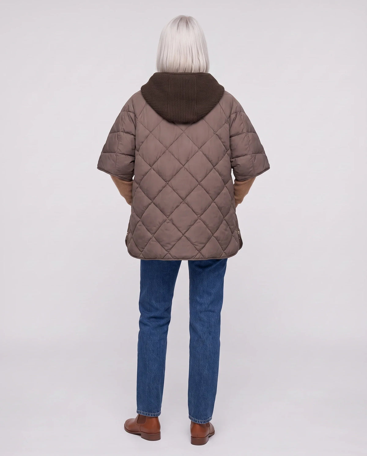 Cape matelassée à capuche tricot
