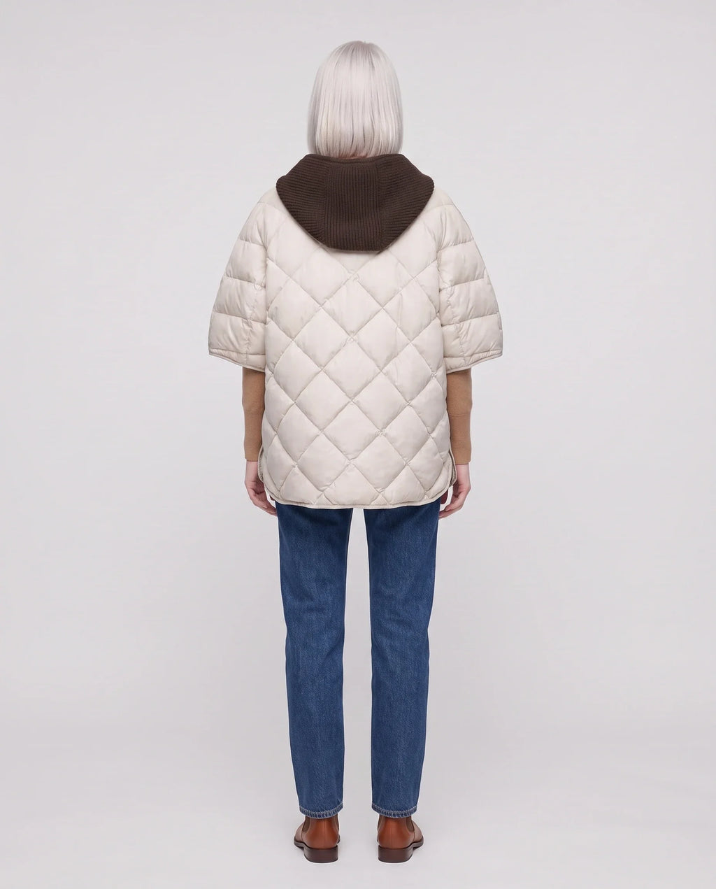 Cape matelassée à capuche tricot