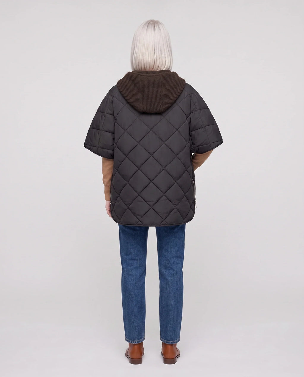 Cape matelassée à capuche tricot
