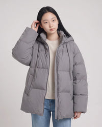Doudoune oversize à capuche matelassée
