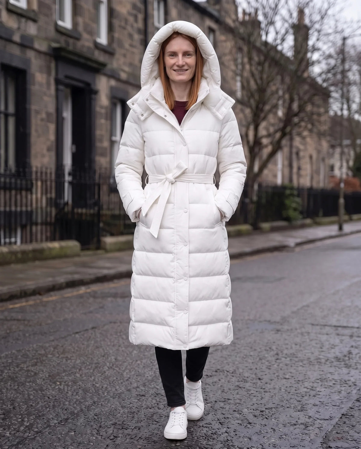 Doudoune extra-longue à capuche et ceinture