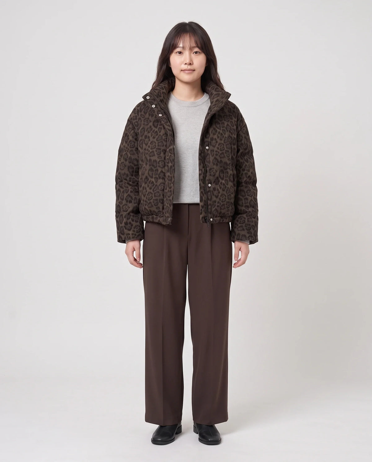 Doudoune courte léopard à patte à pressions