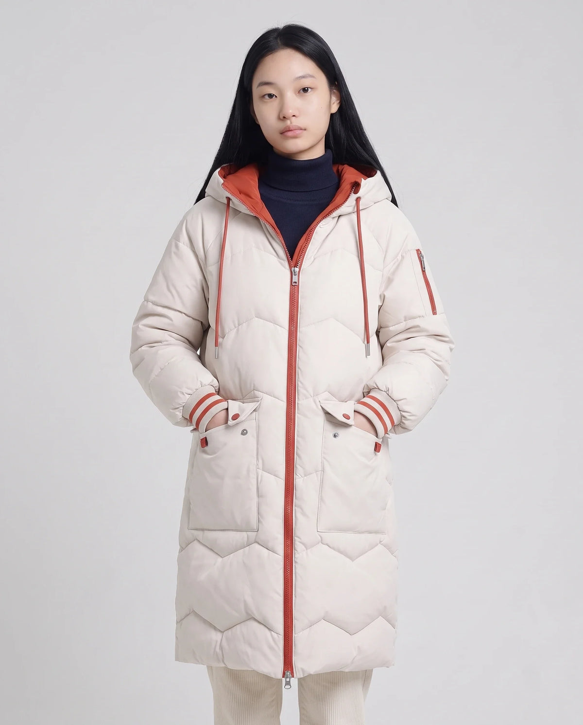 Doudoune longue oversize à chevrons et capuche