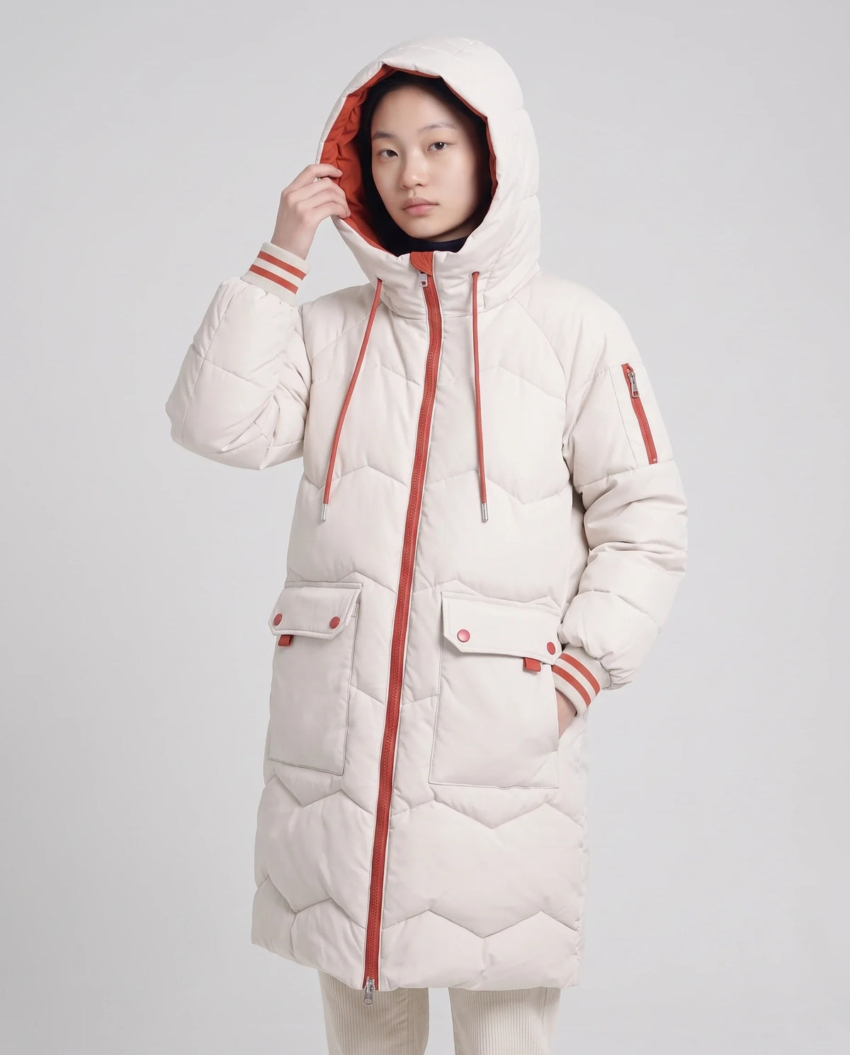 Doudoune longue oversize à chevrons et capuche