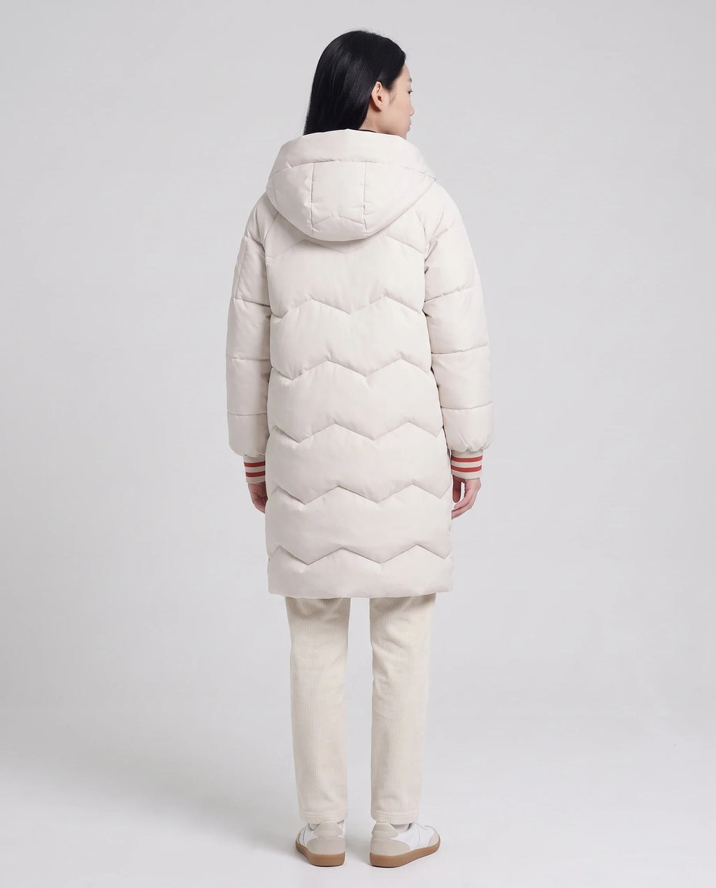 Doudoune longue oversize à chevrons et capuche