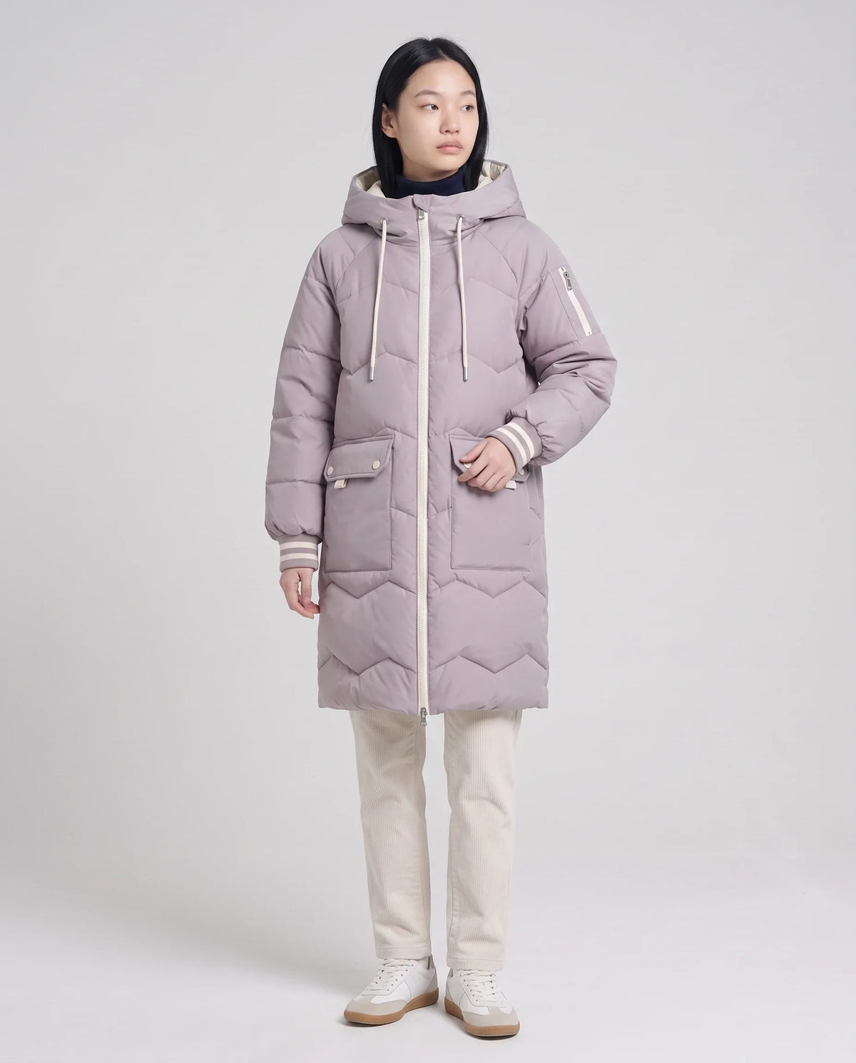 Doudoune longue oversize à chevrons et capuche